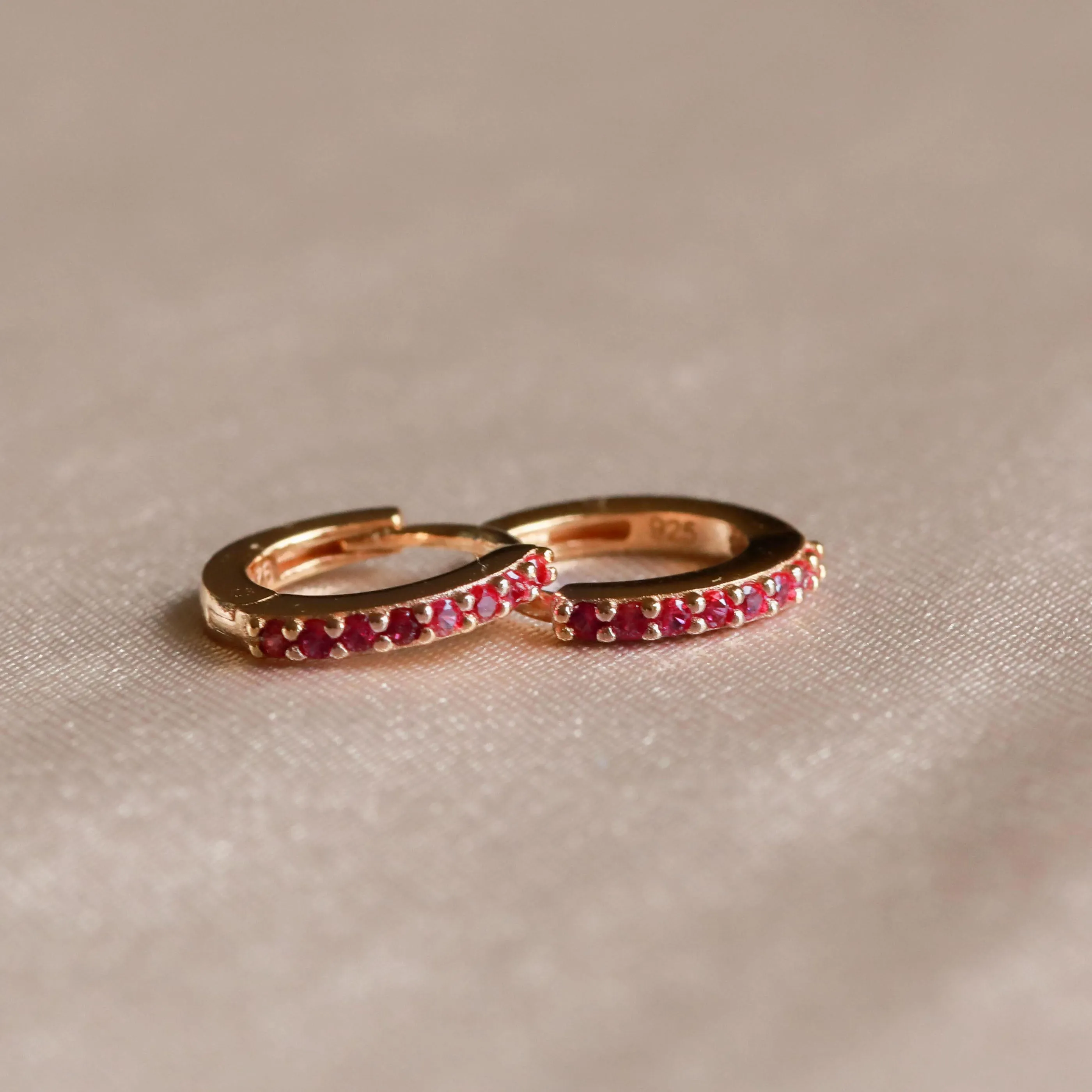 July Birthstone Huggies in Gold with Ruby CZ