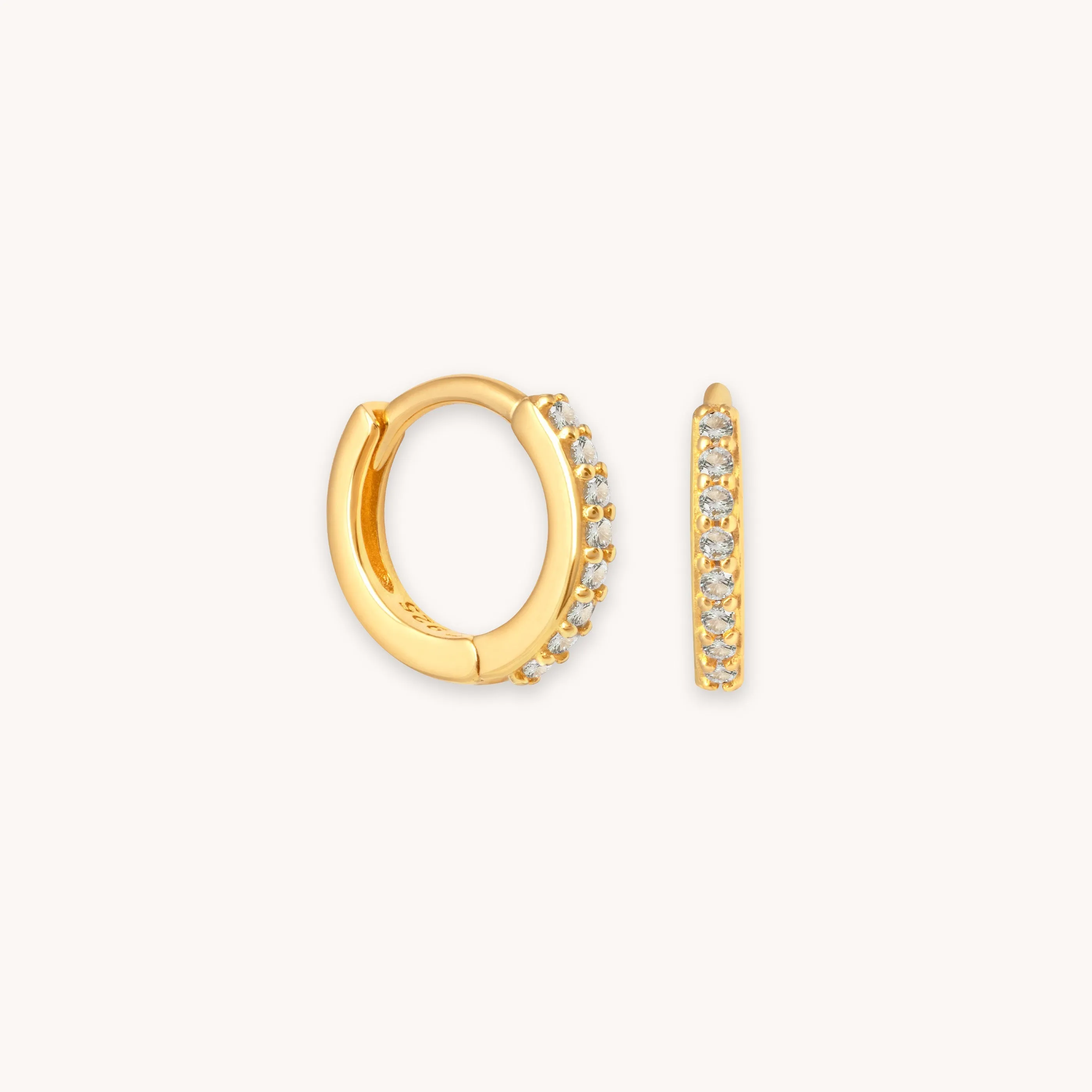 March Birthstone Huggies in Gold with Aquamarine CZ